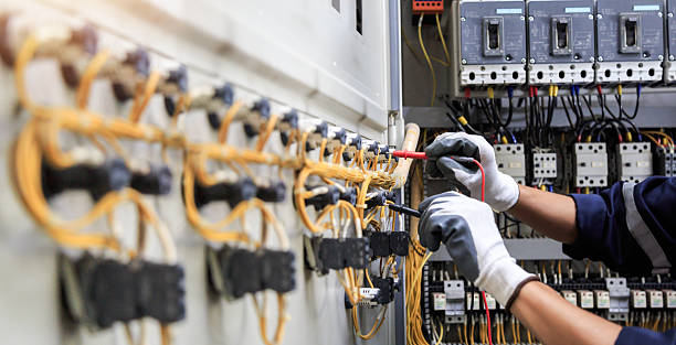 Professional Electrician technician working in Muscatine, IA
